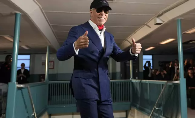 Tommy Hilfiger attends his Spring/Summer 2025 fashion show onboard a Staten Island Ferry as part of New York Fashion Week on Sunday, Sept. 8, 2024, in New York. (Photo by Charles Sykes/Invision/AP)