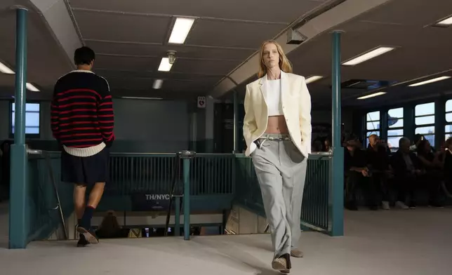 Models walk the runway during the Tommy Hilfiger Spring/Summer 2025 fashion show onboard a Staten Island Ferry as part of New York Fashion Week on Sunday, Sept. 8, 2024, in New York. (Photo by Charles Sykes/Invision/AP)