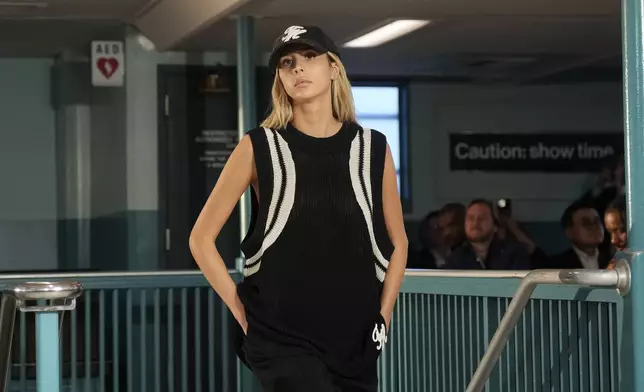 A model walks the runway during the Tommy Hilfiger Spring/Summer 2025 fashion show onboard a Staten Island Ferry as part of New York Fashion Week on Sunday, Sept. 8, 2024, in New York. (Photo by Charles Sykes/Invision/AP)