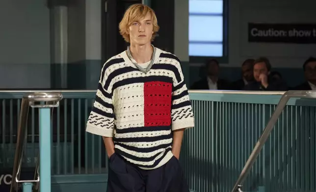 A model walks the runway during the Tommy Hilfiger Spring/Summer 2025 fashion show onboard a Staten Island Ferry as part of New York Fashion Week on Sunday, Sept. 8, 2024, in New York. (Photo by Charles Sykes/Invision/AP)