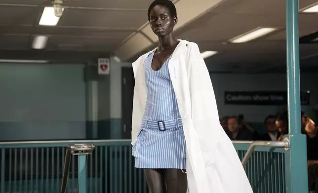 A model walks the runway during the Tommy Hilfiger Spring/Summer 2025 fashion show onboard a Staten Island Ferry as part of New York Fashion Week on Sunday, Sept. 8, 2024, in New York. (Photo by Charles Sykes/Invision/AP)