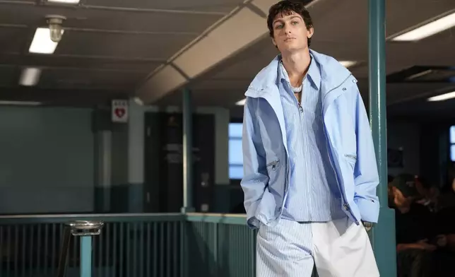 A model walks the runway during the Tommy Hilfiger Spring/Summer 2025 fashion show onboard a Staten Island Ferry as part of New York Fashion Week on Sunday, Sept. 8, 2024, in New York. (Photo by Charles Sykes/Invision/AP)