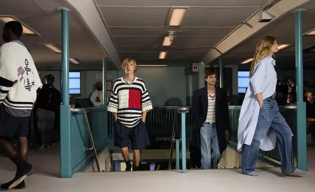 Models walk the runway during the Tommy Hilfiger Spring/Summer 2025 fashion show onboard a Staten Island Ferry as part of New York Fashion Week on Sunday, Sept. 8, 2024, in New York. (Photo by Charles Sykes/Invision/AP)