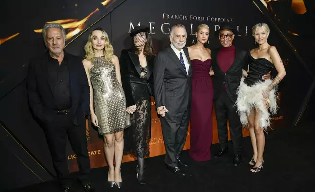 Dustin Hoffman, from left, Chloe Fineman, Aubrey Plaza, Francis Ford Coppola, Nathalie Emmanuel, Giancarlo Esposito, and Grace VanderWaal attend the premiere of "Megalopolis" on Monday, Sept. 23, 2024, at AMC Lincoln Square in New York. (Photo by Evan Agostini/Invision/AP)