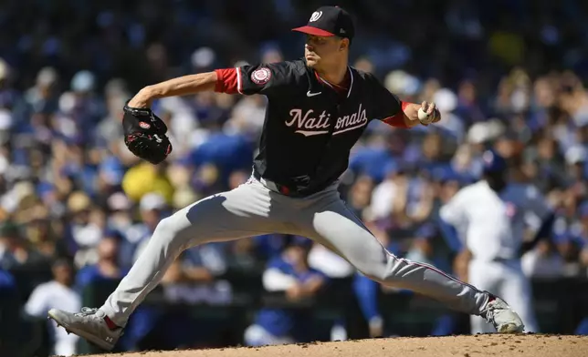 Washington Nationals starter MacKenzie Gore delivers a pitch during the first inning of a baseball game against the Chicago Cubs in Chicago, Saturday, Sept. 21, 2024. (AP Photo/Paul Beaty)