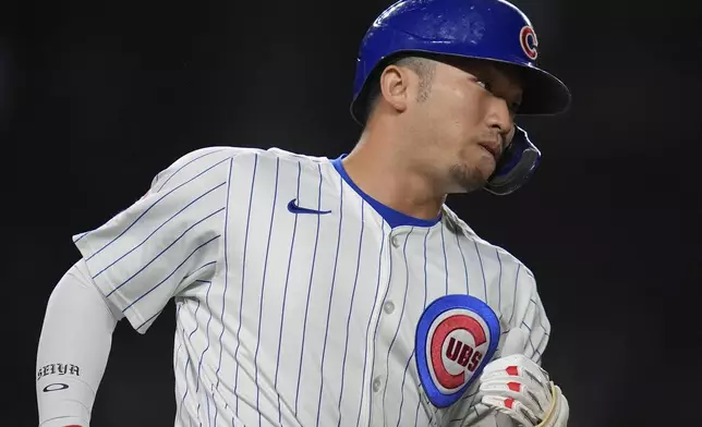 Chicago Cubs designated hitter Seiya Suzuki runs the bases on a two-run home run during the third inning of a baseball game against the Washington Nationals, Thursday, Sept. 19, 2024, in Chicago. (AP Photo/Erin Hooley)