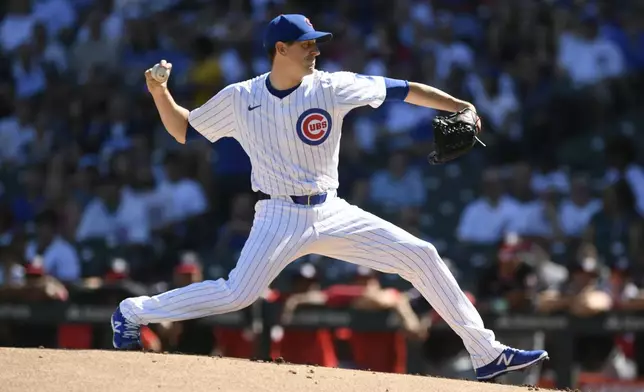 Chicago Cubs starter Kyle Hendricks delivers a pitch during the first inning of a baseball game against the Washington Nationals in Chicago, Saturday, Sept. 21, 2024. (AP Photo/Paul Beaty)