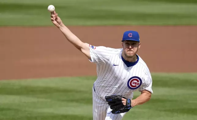 Chicago Cubs starting pitcher Jameson Taillon delivers during the first inning of a baseball game against the Washington Nationals on Friday, Sept. 20, 2024, in Chicago. (AP Photo/Charles Rex Arbogast)