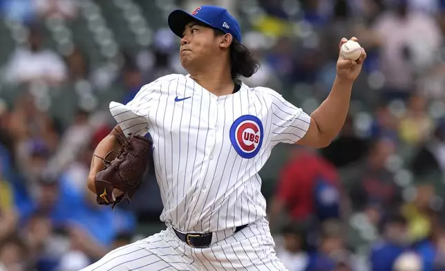 Chicago Cubs starting pitcher Shota Imanaga, of Japan, throws against the Washington Nationals during the first inning of a baseball game in Chicago, Sunday, Sept. 22, 2024. (AP Photo/Nam Y. Huh)