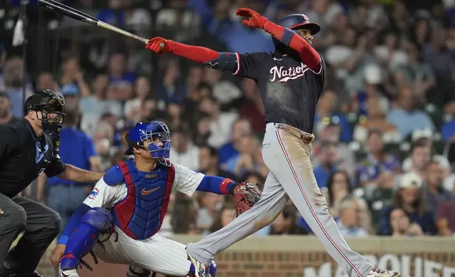 Washington Nationals' CJ Abrams hits a double during the third inning of a baseball game against the Chicago Cubs, Thursday, Sept. 19, 2024, in Chicago. (AP Photo/Erin Hooley)