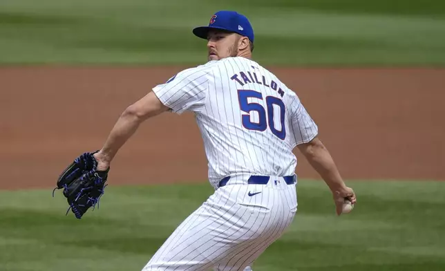 Chicago Cubs starting pitcher Jameson Taillon winds up during the first inning of a baseball game against the Washington Nationals on Friday, Sept. 20, 2024, in Chicago. (AP Photo/Charles Rex Arbogast)