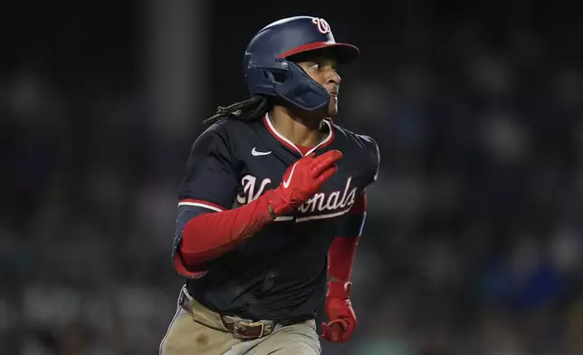 Washington Nationals' CJ Abrams runs the bases on a double during the third inning of a baseball game against the Chicago Cubs, Thursday, Sept. 19, 2024, in Chicago. (AP Photo/Erin Hooley)