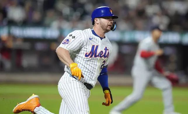 New York Mets' Pete Alonso runs to second base for a double during the fifth inning of a baseball game against the Washington Nationals, Tuesday, Sept. 17, 2024, in New York. (AP Photo/Frank Franklin II)