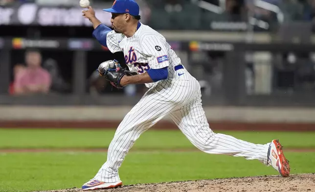 New York Mets' Edwin Diaz pitches during the ninth inning of a baseball game against the Washington Nationals, Monday, Sept. 16, 2024, in New York. (AP Photo/Frank Franklin II)