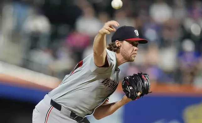 Washington Nationals' Jake Irvin pitches during the first inning of a baseball game against the New York Mets, Monday, Sept. 16, 2024, in New York. (AP Photo/Frank Franklin II)