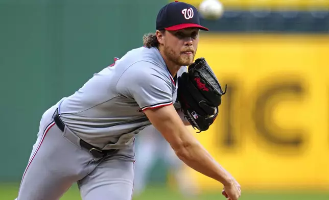 Washington Nationals starting pitcher Jake Irvin delivers during the first inning of a baseball game against the Pittsburgh Pirates in Pittsburgh, Thursday, Sept. 5, 2024. (AP Photo/Gene J. Puskar)