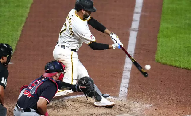 Pittsburgh Pirates' Isiah Kiner-Falefa (7) singles off Washington Nationals relief pitcher Jacob Barnes, driving in a run, during the eighth inning of the second baseball game of a doubleheader in Pittsburgh, Saturday, Sept. 7, 2024. (AP Photo/Gene J. Puskar)