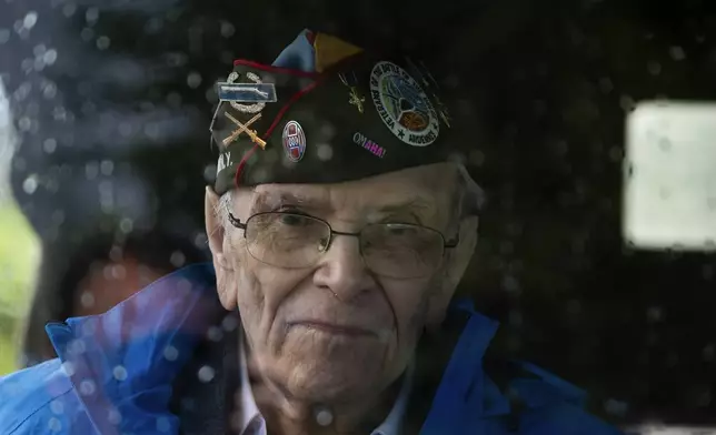 World War II veteran Kenneth Thayer sits in a jeep during a ceremony marking the 80th anniversary of the liberation of the south of the Netherlands in Mesch, Thursday, Sept. 12, 2024. (AP Photo/Peter Dejong, Pool)