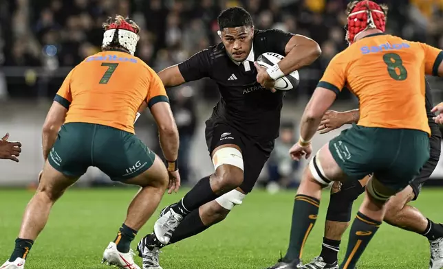 New Zealand's Tupou Vaa'i runs at the defence during their Rugby Championship match between the All Blacks and the Wallabies in Wellington, New Zealand, Saturday, Sept. 28, 2024.(Andrew Cornaga/Photosport via AP)