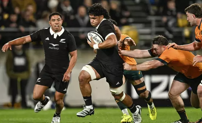 New Zealand's Wallace Sititi makes a run during their Rugby Championship match between the All Blacks and the Wallabies in Wellington, New Zealand, Saturday, Sept. 28, 2024.(Andrew Cornaga/Photosport via AP)