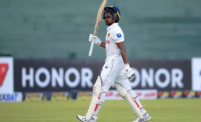 Sri Lanka's Kamindu Mendis leaves the field after losing his wicket to New Zealand's Ajaz Patel on the first day of the first cricket test match between New Zealand and Sri Lanka in Galle, Sri Lanka, Wednesday, Sept. 18, 2024. (AP Photo/Viraj Kothalawala)