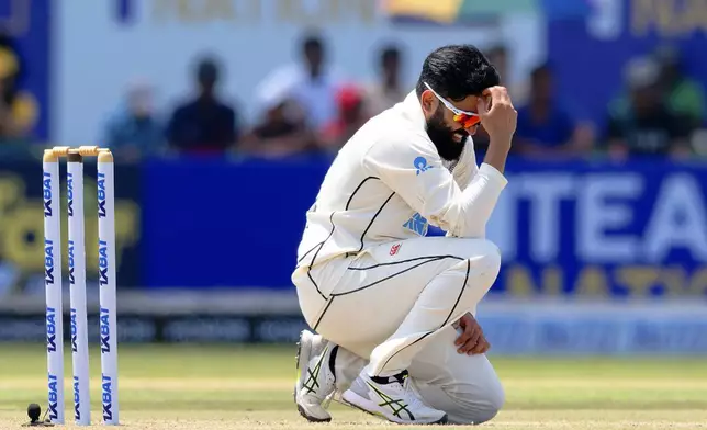 New Zealand's Ajaz Patel reacts after bowling a delivery on the first day of the first cricket test match between New Zealand and Sri Lanka in Galle, Sri Lanka, Wednesday, Sept. 18, 2024. (AP Photo/Viraj Kothalawala)