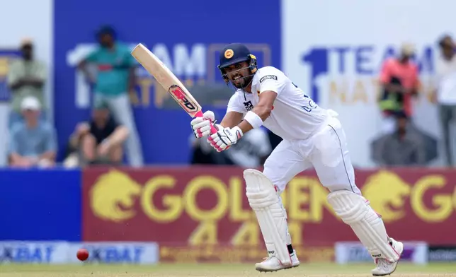 Sri Lanka's Dinesh Chandimal plays a shot on the first day of the first cricket test match between New Zealand and Sri Lanka in Galle, Sri Lanka, Wednesday, Sept. 18, 2024. (AP Photo/Viraj Kothalawala)