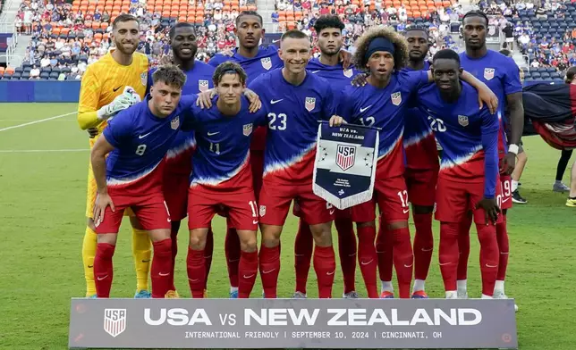 United States players pose for a team photo prior to a friendly soccer match against New Zealand, Tuesday, Sept. 10, 2024, in Cincinnati. (AP Photo/Jeff Dean)