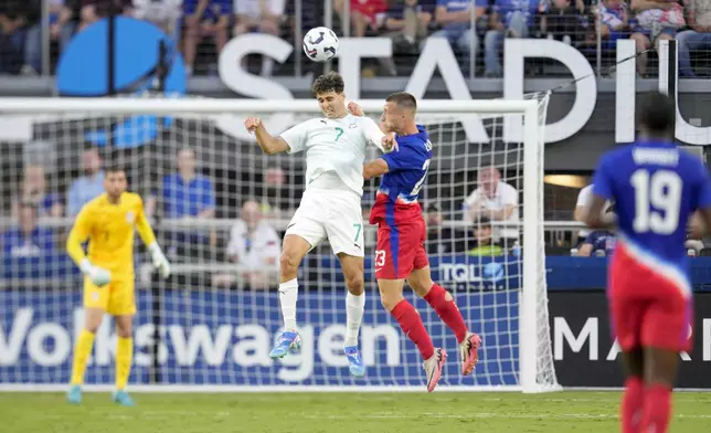 New Zealand midfielder Matthew Garbett (7) heads the ball against United States defender Kristoffer Lund (23) during the first half of a friendly soccer match, Tuesday, Sept. 10, 2024, in Cincinnati. (AP Photo/Jeff Dean)