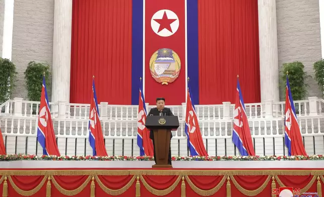 In this photo provided by the North Korean government, North Korean leader Kim Jong Un delivers a speech, marking the country's 76th founding anniversary in Pyongyang, North Korea Monday, Sept. 9, 2024. Independent journalists were not given access to cover the event depicted in this image distributed by the North Korean government. The content of this image is as provided and cannot be independently verified. Korean language watermark on image as provided by source reads: "KCNA" which is the abbreviation for Korean Central News Agency. (Korean Central News Agency/Korea News Service via AP)