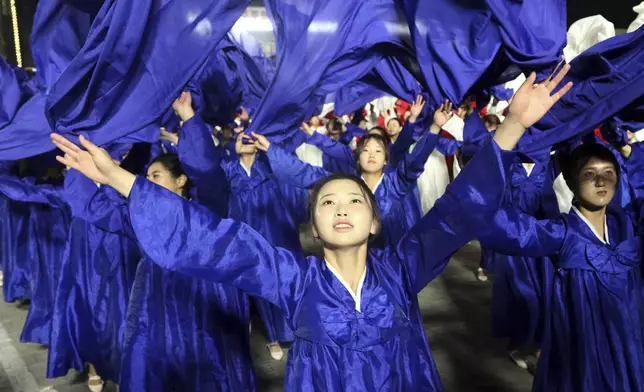 North Koreans celebrate the country's 76th founding anniversary at Kim Il Sung Square in Pyongyang, North Korea Sunday, Sept. 8, 2024. (AP Photo/Jon Chol Jin)