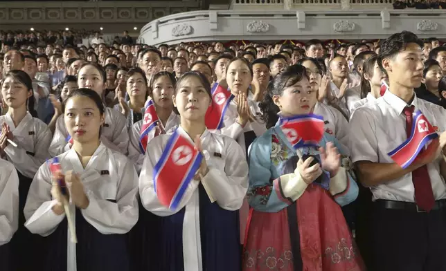 North Koreans celebrate the country's 76th founding anniversary at Kim Il Sung Square in Pyongyang, North Korea Sunday, Sept. 8, 2024. (AP Photo/Jon Chol Jin)