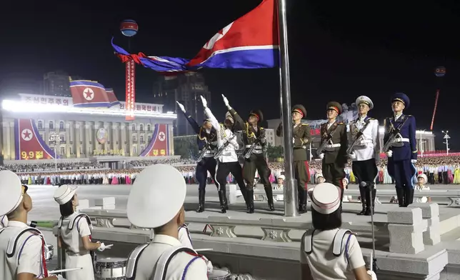 A national flag is hoisted during a celebration ceremony of the country's 76th founding anniversary at Kim Il Sung Square in Pyongyang, North Korea Sunday, Sept. 8, 2024. (AP Photo/Jon Chol Jin)