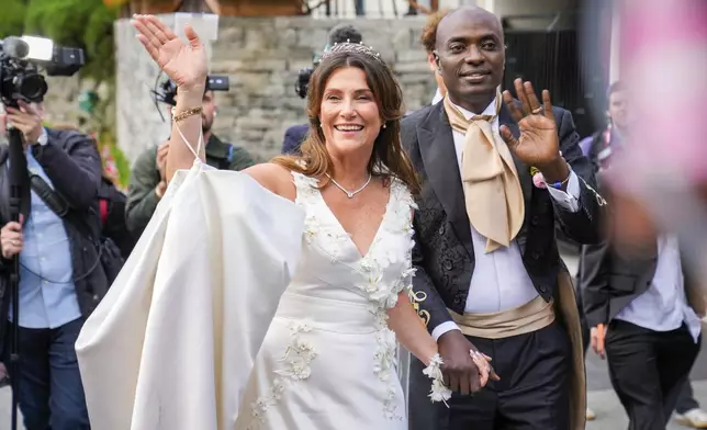 Norway's Princess Martha Louise and Durek Verrett arrive for their wedding party, in Geiranger, Norway, Saturday Aug. 31, 2024. (Heiko Junge/NTB via AP)