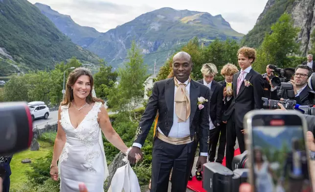 Norway's Princess Martha Louise and Durek Verrett arrive for their wedding party, in Geiranger, Norway, Saturday Aug. 31, 2024. (Cornelius Poppe/NTB via AP)