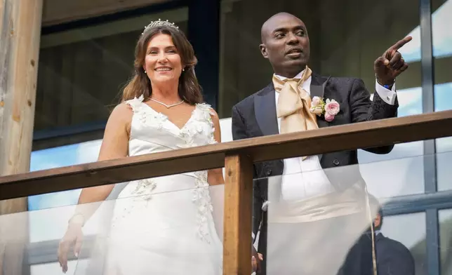 Norway's Princess Martha Louise and Durek Verrett arrive for their wedding party, in Geiranger, Norway, Saturday Aug. 31, 2024. (Heiko Junge/NTB via AP)