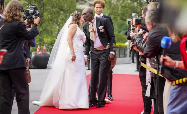 Norway's Princess Martha Louise and Durek Verrett arrive for their wedding party, in Geiranger, Norway, Saturday Aug. 31, 2024. (Heiko Junge/NTB via AP)