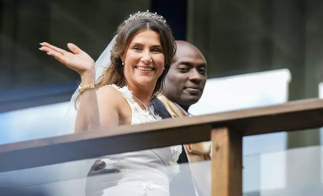 Norway's Princess Martha Louise and Durek Verrett arrive for their wedding party, in Geiranger, Norway, Saturday Aug. 31, 2024. (Heiko Junge/NTB via AP)