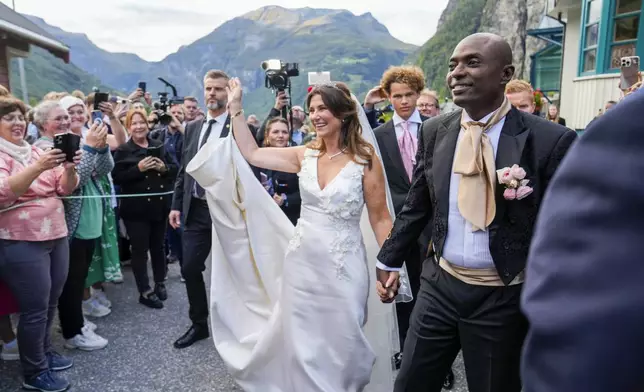 Norway's Princess Martha Louise and Durek Verrett arrive for their wedding party, in Geiranger, Norway, Saturday Aug. 31, 2024. (Heiko Junge/NTB via AP)