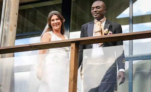 Norway's Princess Martha Louise and Durek Verrett arrive for their wedding party, in Geiranger, Norway, Saturday Aug. 31, 2024. (Heiko Junge/NTB via AP)