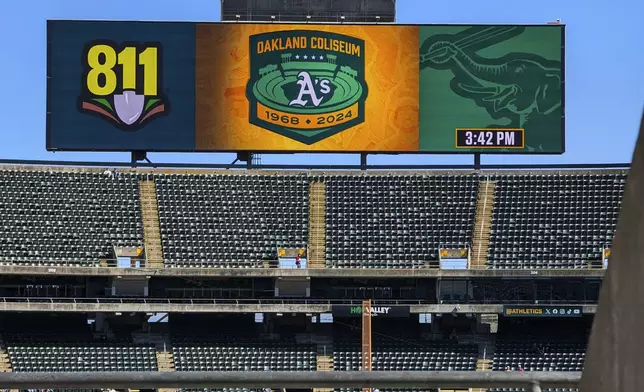 A view of the stadium scoreboard at the Oakland Coliseum is seen, Sept. 2, 2024, in Oakland, Calif. (AP Photo/Michael Liedtke)