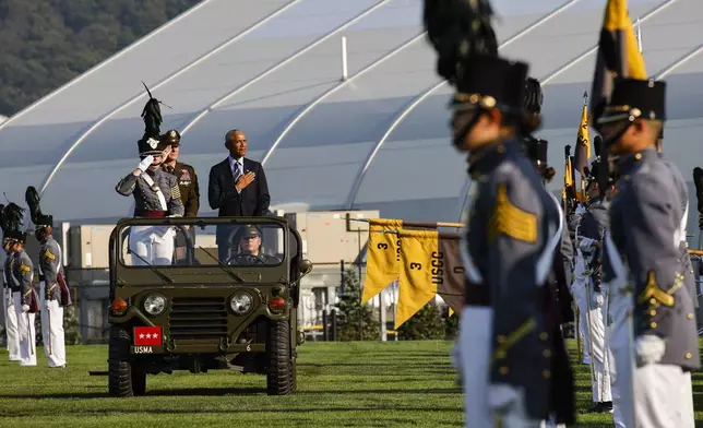 Former President Barack Obama, center, attends to receive the 2024 Sylvanus Thayer Award from the West Point Association of Graduates during ceremonies hosted by the U.S. Military Academy, at West Point, Thursday, Sept. 19, 2024, in New York. (AP Photo/Eduardo Munoz Alvarez)