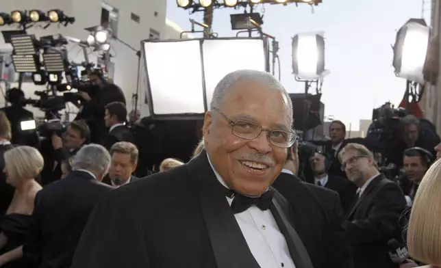 FILE - James Earl Jones arrives before the 84th Academy Awards on Sunday, Feb. 26, 2012, in the Hollywood section of Los Angeles. Jones, who overcame racial prejudice and a severe stutter to become a celebrated icon of stage and screen has died at age 93. His agent, Barry McPherson, confirmed Jones died Monday morning, Sept. 9, 2024, at home. (AP Photo/Chris Carlson, File)