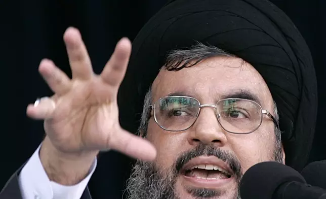 FILE - Hezbollah leader Hassan Nasrallah, delivers a speech during the annual rally to mark Al-Quds Day, Jerusalem Day, in the southern suburbs of Beirut, Friday, Oct. 28, 2005. (AP Photo/Hussein Malla, File)