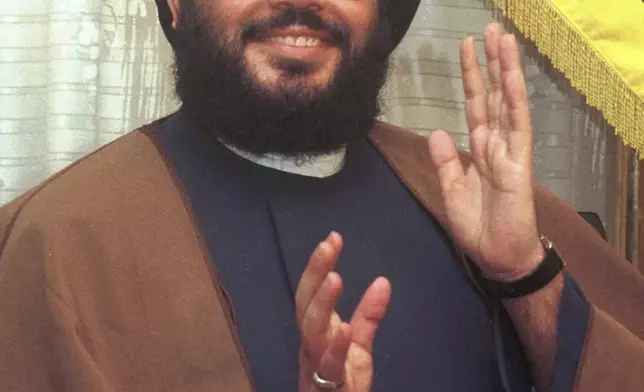 FILE - Hezbollah leader Hassan Nasrallah speaks to reporters in Beirut, Thursday, April 2, 1998. (AP Photo/Ali Mohamed, File)