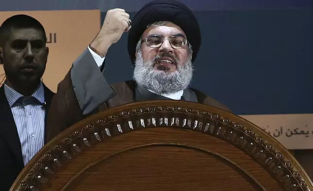 FILE - Hezbollah leader Hassan Nasrallah speaks during a rally to mark Jerusalem day, in Beirut's southern suburb, on Aug. 2, 2013. (AP Photo/Hussein Malla, File)