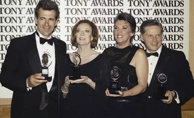 FILE - Tony Award winners, from left, James Naughton, best actor in "City of Angels," Maggie Smith, best actress for "Lettice and Lovage," Tyne Daly, best actress for "Gypsy," and Robert Morse, best actor for "Iru" pose at the Tony Awards in New York, June 3, 1990. Smith, who won an Oscar for “The Prime of Miss Jean Brodie” in 1969 and won new fans in the 21st century as the dowager Countess of Grantham in “Downton Abbey,” has died at 89. (AP Photo/Richard Drew, File)