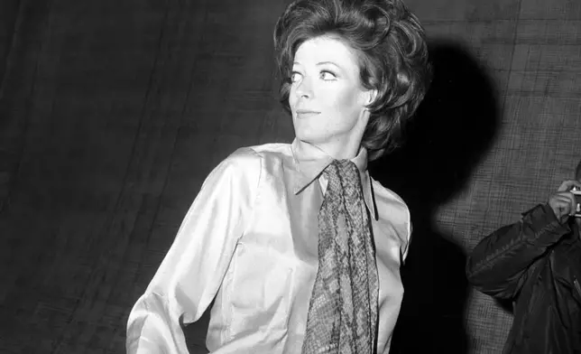 FILE - British actress Maggie Smith, the British actress, appears on the stage of the Old Vic in London, on April 8, 1970, during an intermission of rehearsal of "The Beaux' Stratagem." Smith, who won an Oscar for “The Prime of Miss Jean Brodie” in 1969 and won new fans in the 21st century as the dowager Countess of Grantham in “Downton Abbey,” has died at 89. (AP Photo/ L Brown, File)