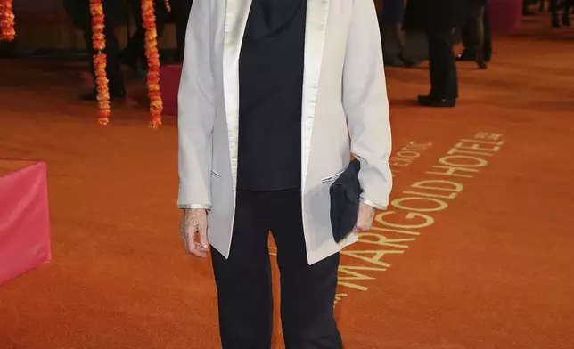 FILE - ACtress Maggie Smith appears at the World Premiere of "The Second Best Exotic Marigold Hotel" at a central London cinema in Leicester Square, on Feb. 17, 2015. Smith, who won an Oscar for “The Prime of Miss Jean Brodie” in 1969 and won new fans in the 21st century as the dowager Countess of Grantham in “Downton Abbey,” has died at 89. (Photo by Joel Ryan/Invision/AP, File)