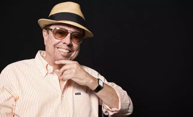 FILE - Sergio Mendes stands for a portrait in Los Angeles on Aug. 27, 2014. (Photo by Omar Vega/Invision/AP, File)